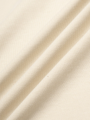 Áo Polo Dệt Kim Dây Kéo Form Slimfit PO174 Màu Trắng Kem